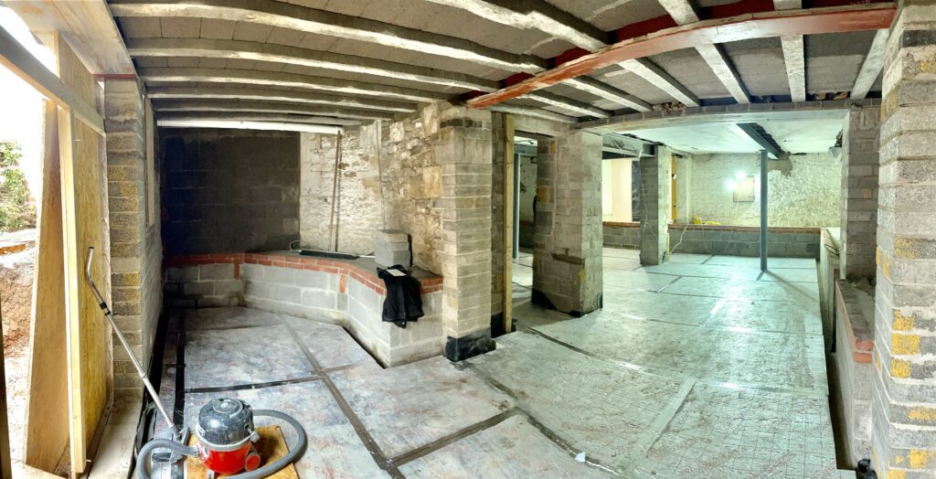 Lower-ground level stripped back to stone piers with new steel beams installed overhead