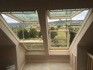 Roof windows looking out over open countryside